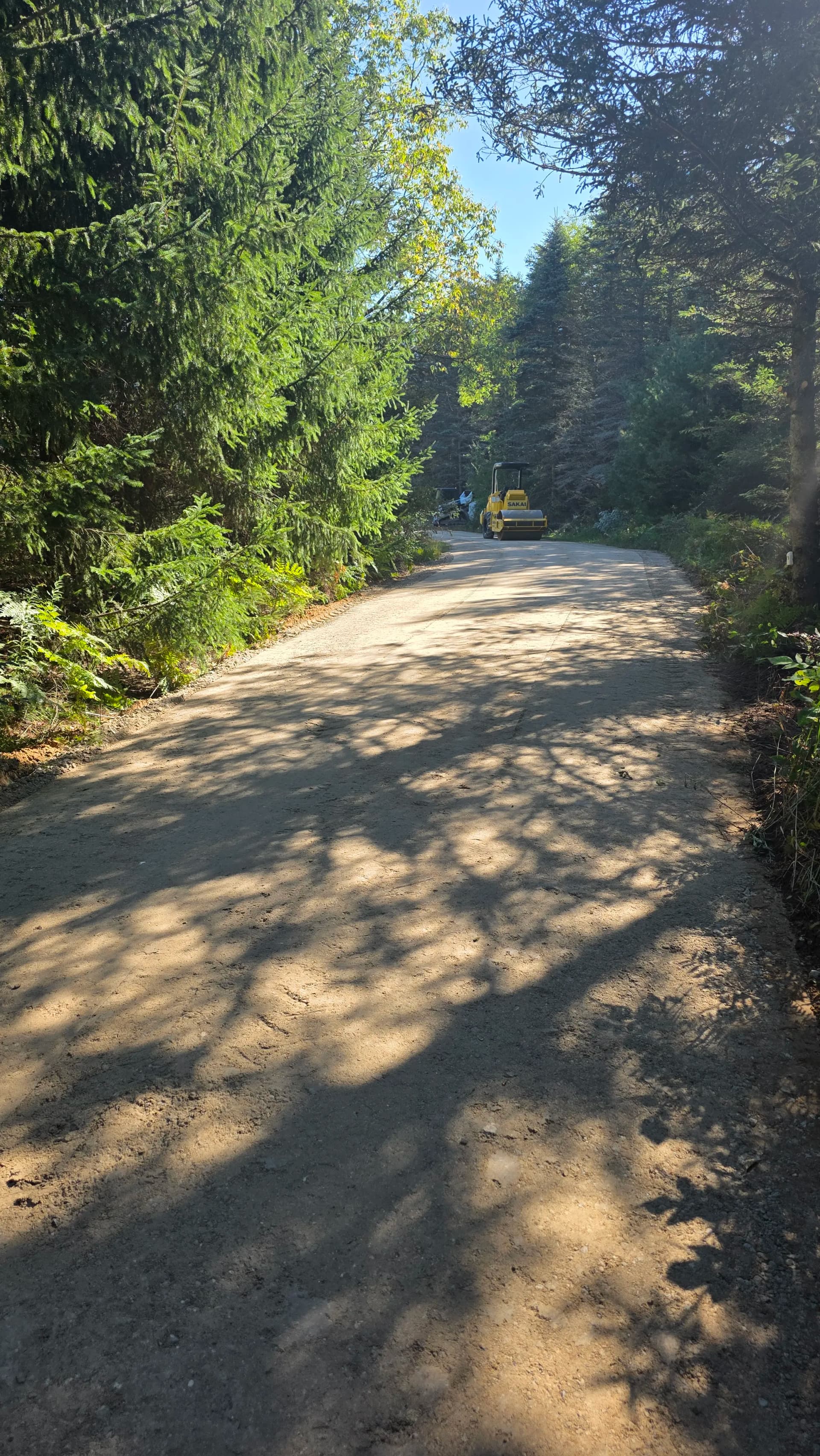 Gallery photos for Crushed Concrete Driveway Fixes Drainage and Washout Problems: Image #4