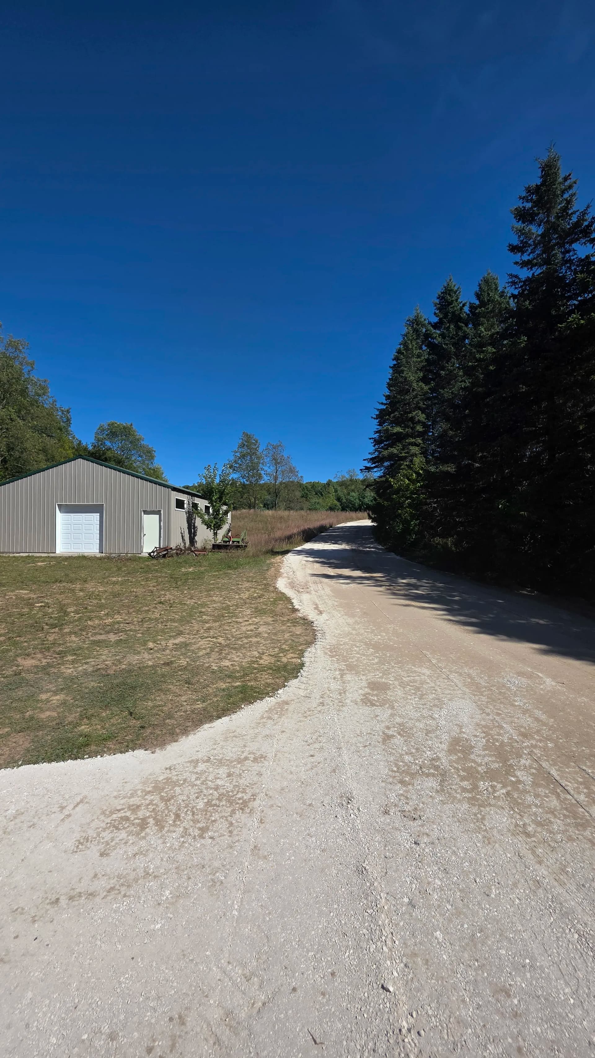 Crushed Concrete Driveway Fixes Drainage and Washout Problems image