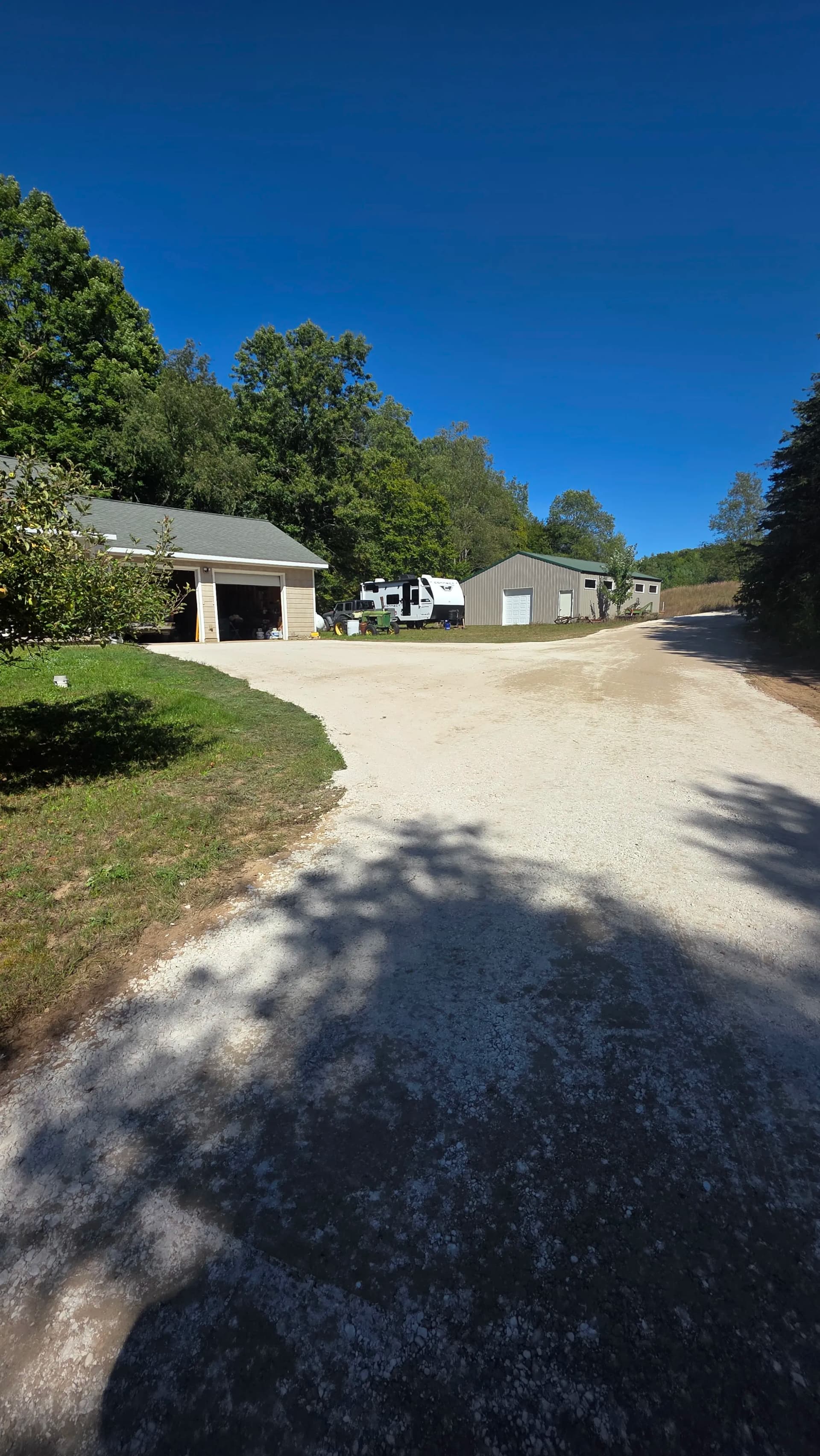 Gallery photos for Crushed Concrete Driveway Fixes Drainage and Washout Problems: Image #1